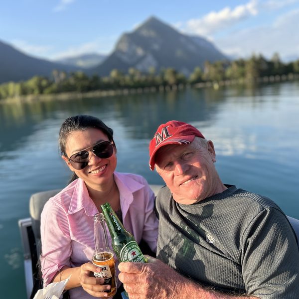 Couple enjoying beers on the SunChill pontoon